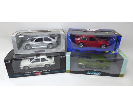 Fours 1:18 scale die-cast model cars, comprising two UT Models, a Ford Escort RS Cosworth in silver, another Cosworth in red,