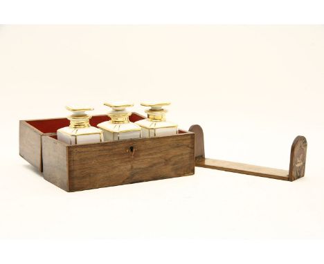 A Victorian inlaid rosewood tea caddy, fitted three white porcelain and parcel gilt canisters, 24cm x 11cm x 15cm, together w