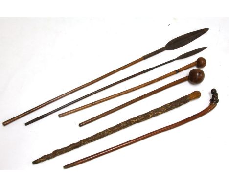 Zulu weapons, comprising: two spears, two knob kerries and an old walking stick