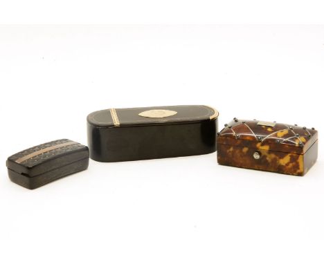 A George III tortoiseshell and gold inlaid snuff box, of ovoid form, 9cm long, together with a smaller basket weave example, 