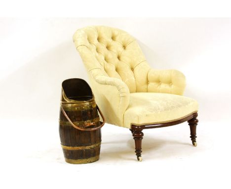 A Victorian low armchair, with button upholstered back, together with a coopered coal scuttle (2)