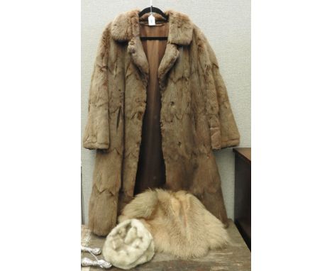 A Siberian squirrel ¾ length coat, and fox fur collar, and faux fur hat