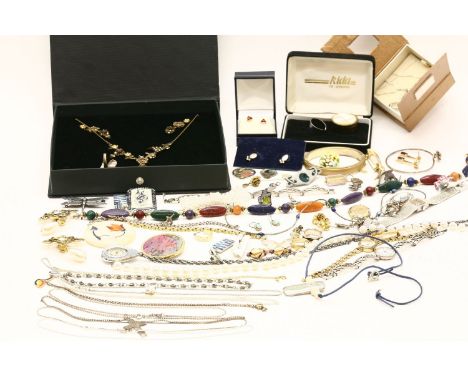 A collection of costume jewellery, to include a silver three colour ring, costume earrings, a silver gilt simulate opal brooc