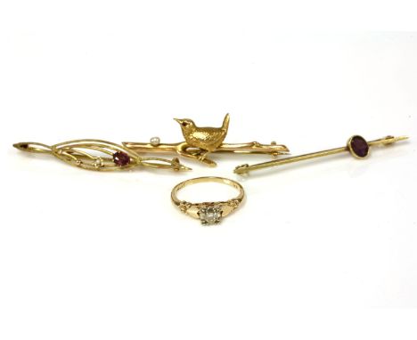 A gold single stone diamond ring, marked 14k, signed Fidelity, 1.61g, a 9ct gold stick pin in the form of a bird perched on a