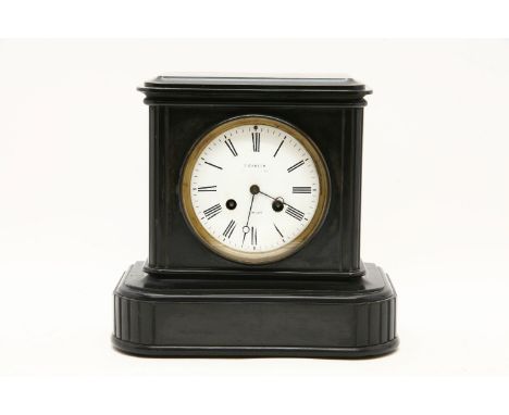 A Victorian slate mantle clock, the white enamel dial, signed T.Ganter, 28 x 17 x 28cm, together with a pair of brass cluster