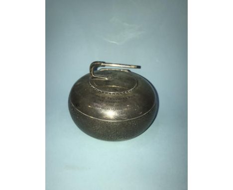 A silver inkwell in the form of a curling stone, 7oz, Birmingham 1931