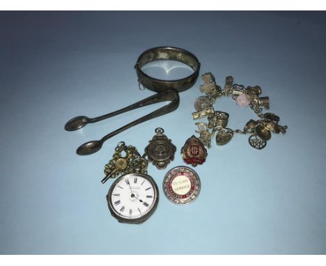 Assorted silver, to include a bangle, and sugar tongs etc.