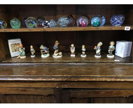Eight Hummel figures