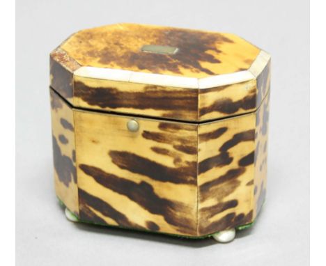 GEORGE III BLOND TORTOISESHELL TEA CADDY, of octagonal form with mother of pearl borders and bun feet, width 10cm
