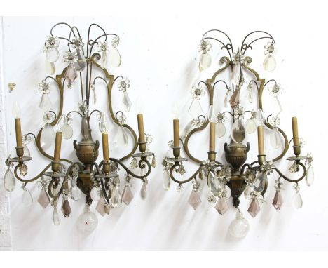 PAIR OF FRENCH FOUR LIGHT GILT BRASS AND CUT GLASS WALL LIGHTS, the branches from a central urn, with glass flowerheads and d