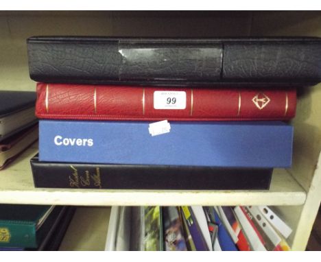A Collection of Four Folders Containing First Day Covers 