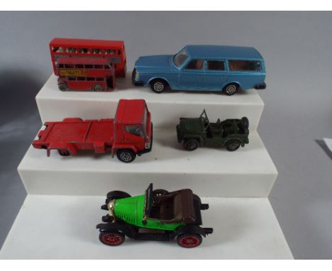 A Collection of Dinky and other Die Cast Toys to include Army Car, Morris, Buses etc