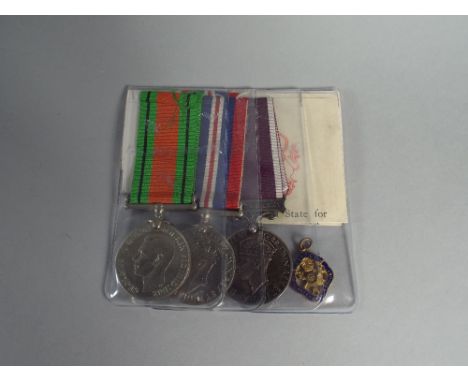 A WWII Defence and War Medal with George VI Army Long Service and Good Conduct Medal to Sgt LEG Davidson Royal Artillery, Bor