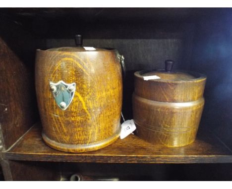 An Oak Biscuit Barrel and An Oak Tobacco Jar