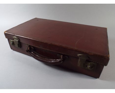 A Small Vintage Leather Suitcase