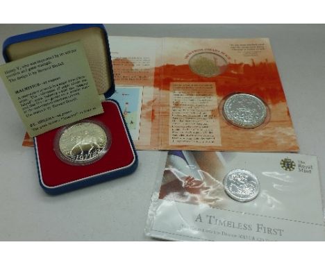 Three commemorative silver coins;- 1977 Jubilee, D-Day and a Timeless First 2013 £20 coin