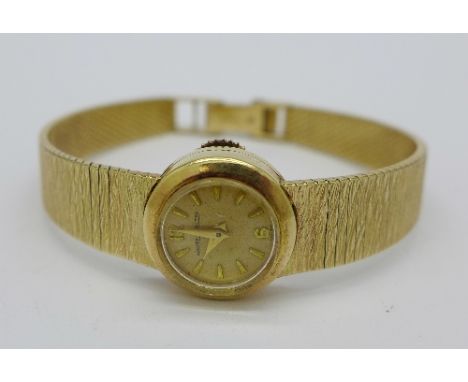 A lady's 9ct gold Jaeger LeCoultre wristwatch, total weight with movement 23g