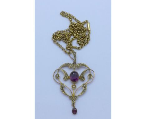A 9ct gold pendant set with amethyst and seed pearl and chain, total weight 4.5g
