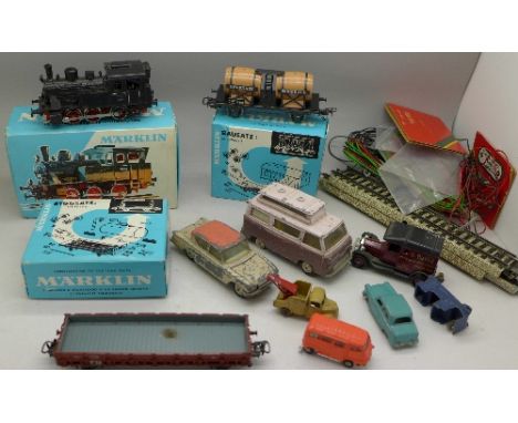 A Marklin 3029 tank locomotive, boxed, two Marklin carriages, 4900 and 4908, boxed, switch gear and track, etc., and die-cast