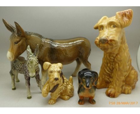 A Melba Ware donkey, a Goebel donkey foal, a Sylvac 1379 dog and two other Sylvac dogs