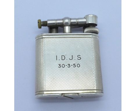 A Dunhill lighter, inscribed I.D.J.S. 30-3-50