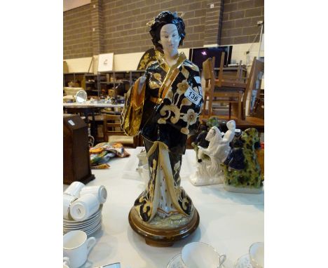 Oriental ceramic figurine of a standing Geisha girl, A/F