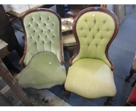 Two Victorian mahogany, green button back upholstered  salon chairs 