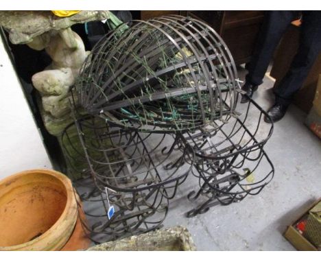 A group of four metalwork planter stands and five metalwork wall baskets 