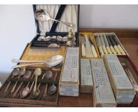 A small quantity of Vintage cutlery and flatware together with a silver plated salt shaker and a boxed set of Apostle teaspoo