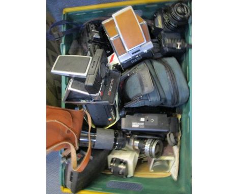 A quantity of vintage 35mm cameras, Polaroid land cameras and a Sony movie camera, to include a Canon T50 1984 Olympic Games 