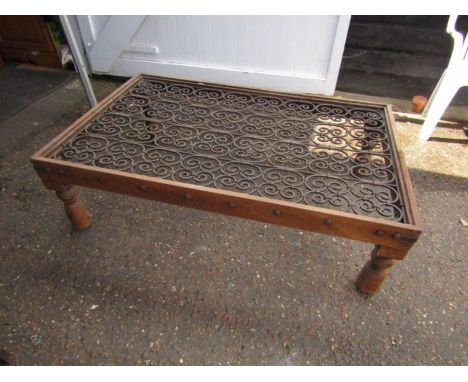 Shesham coffee table with ornate wrought iron panel and glass top H40cm Top 89cm x 136cm approx 