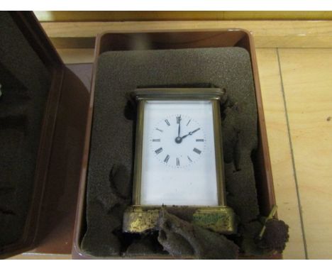 Matthew Norman London carriage clock in box, the clock needs tlc due to innards of box stuck to it