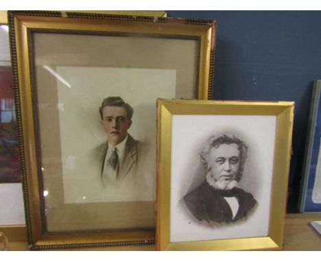 2 framed portrait prints