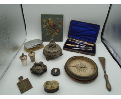 A mixed collectors lot - to include boxed nut crackers, snuff box, a padded Victorian stitch work picture etc...
