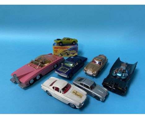 A Corgi Die Cast Man from Uncle Oldsmobile Super 88, The Saint Volvo P1800, Batmobile and James Bond Aston Martin, a Dinky To