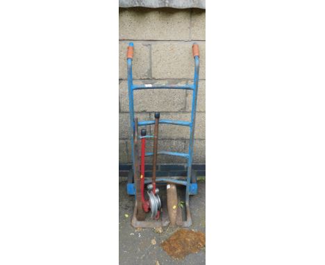 A blue metal sack barrow, anvil and pipe bender, etc. 
