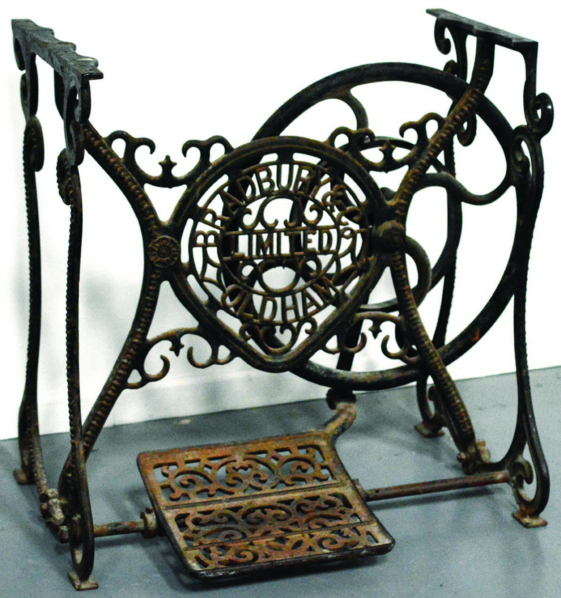 BRADBURY & CO OLDHAM SEWING MACHINE TABLE. 29ins tall, cast iron base