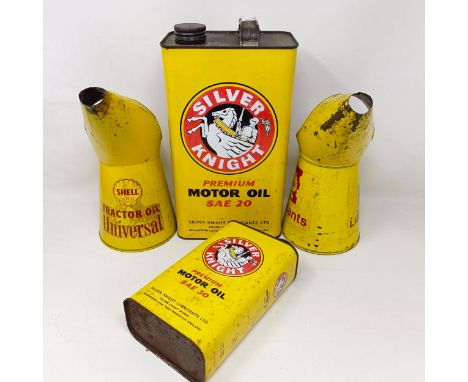 A Shell Lubricants pourer, 26 cm high, a Shell Tractor Oil Universal pourer, 26 cm high, and two Silver Knight oil cans (4) 
