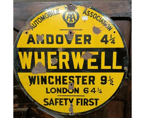 An Automobile Association Andover 4 1/4 Wherwell Winchester 9 1/2, London 64 1/4 Safety First enamel sign, 76 cm diameterSome