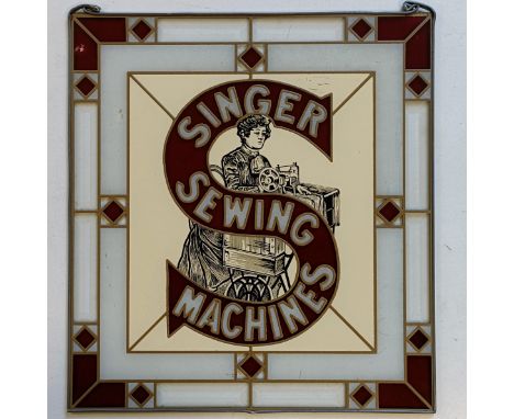 A Singer Sewing Machines painted glass advertising panel, 44.5 x 41 cm 