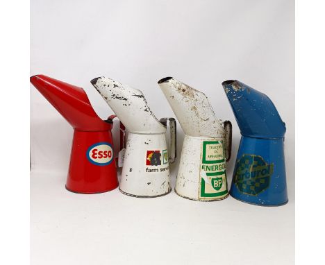 An Esso oil pourer, 26 cm high, a Carburol pourer, and two others (4) 