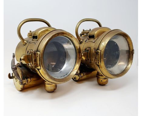 A pair of early 20th century Powell & Hammer brass acetylene headlamps, 25 cm high 