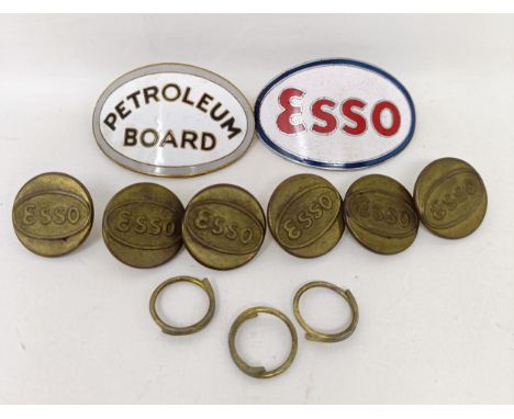 An Esso petrol tanker driver's cap badge, an Aviation fuel petroleum board badge, and a group of Esso buttons   Provenance:  