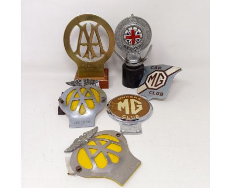 An enamel MG car club badge, an MG Owners Club badge, three AA badges, and a RAC badge (6) 