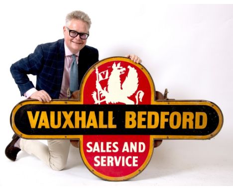 A Vauxhall Bedford Sales and Service target style double sided enamel sign, in a metal frame with hooks, 152.5 cm wideGeneral