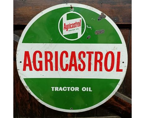An Agricastrol Tractor Oil metal sign, 45.5 cm diameterSome loss and scratches 