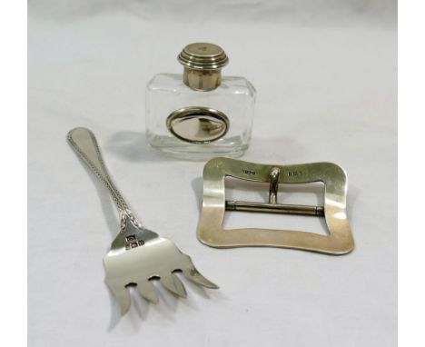 An Edwardian belt buckle, Birmingham 1905, 6cm wide, a small silver mounted perfume bottle, London 1996, 5cm high, and a brea