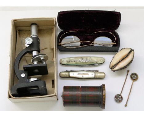 A collection of small items comprised of a Tartanware dice shaker, 7.5cm high, a shell snuff box with silver mounts and gilt 