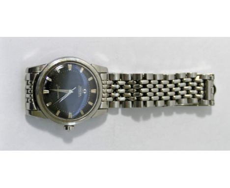 A Gentleman's Omega Automatic Seamaster wrist watch, c.1950s, the black face with baton numerals, with stainless steel case a