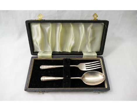 A two-piece silver christening set, comprised of a small spoon and fork, Birmingham 1969, combined weight 1.28ozt, 39.9g case